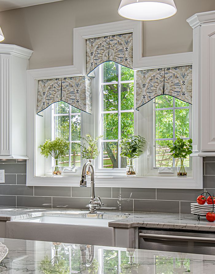 A perfect example of custom valances in these kitchen windows. So cool!