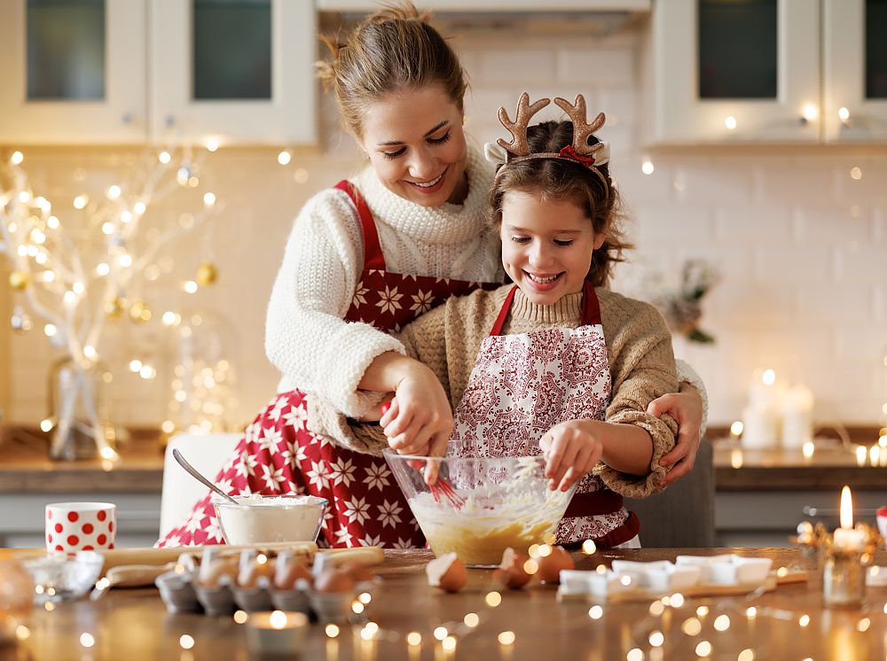 Mother and daughter bake Christmas cookies
